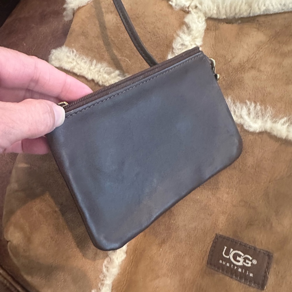 UGG Tan shearling shoulder bag with purse attached inside . Good used condition